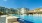 a pool with chairs around it