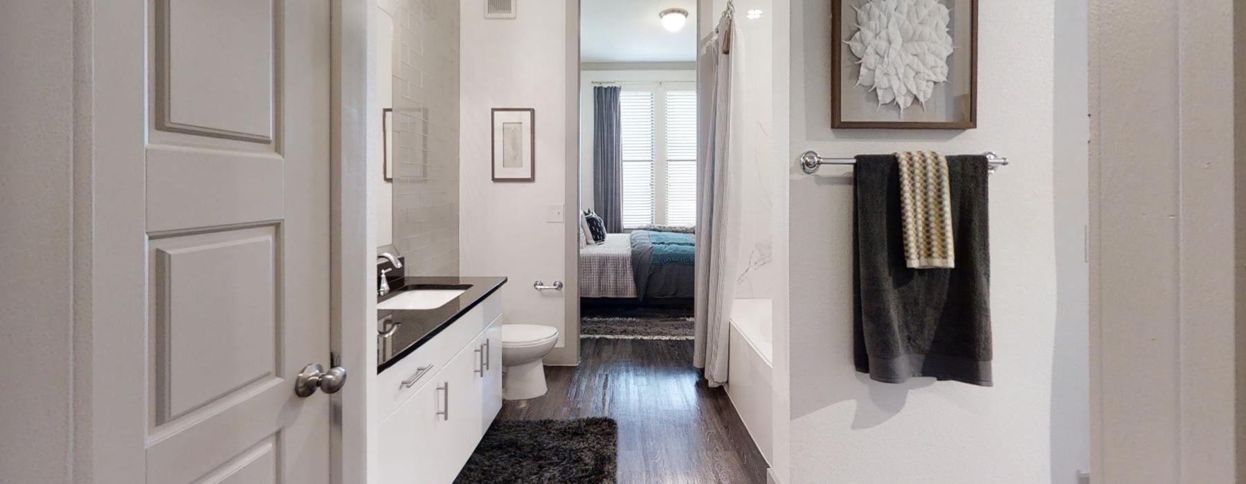a bathroom with a towel and a sink