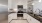 a kitchen with white cabinets