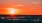 a sunset over a beach