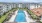 a pool surrounded by buildings